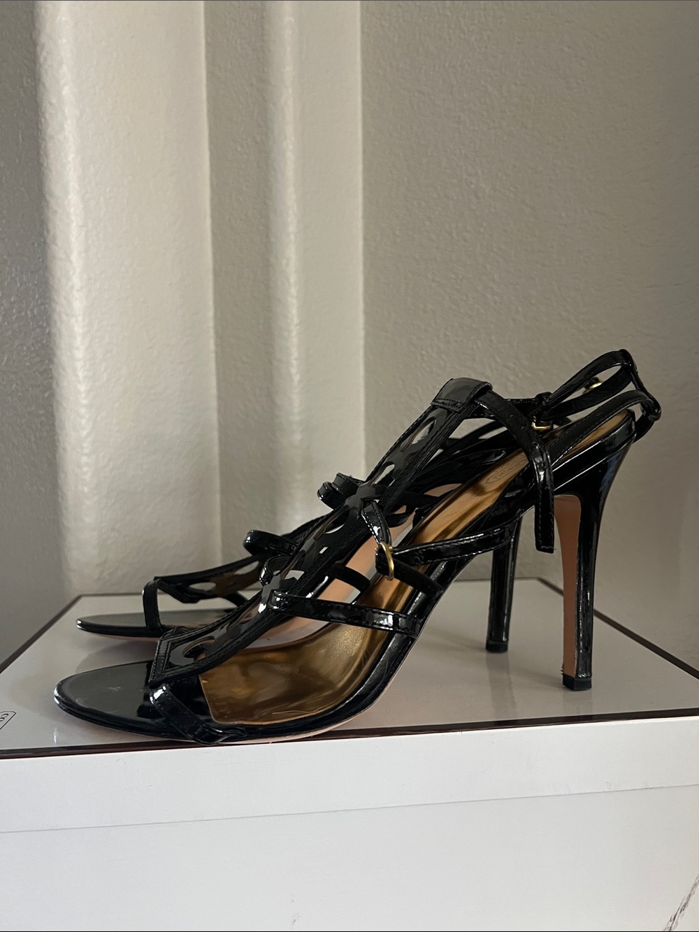 Coach Farrow Black and Gold Strappy High-Heel Sandals